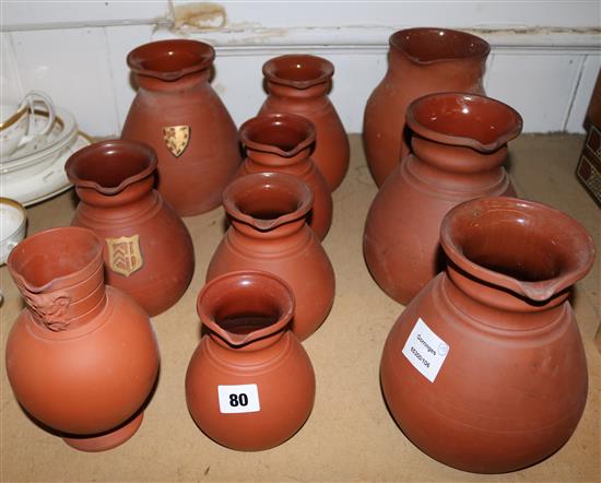 10 Wedgwood terracotta jugs